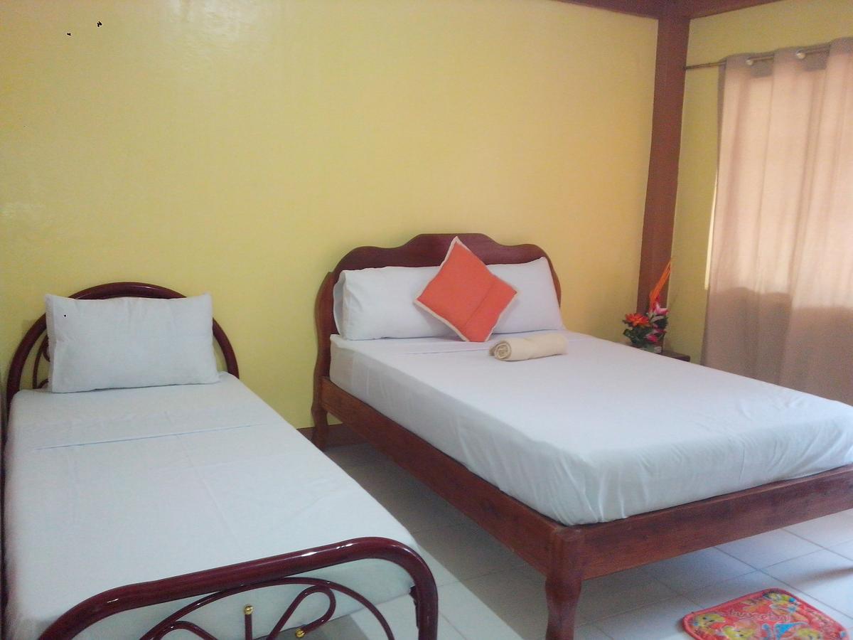 Centillo Travellers Inn Катиклан Екстериор снимка