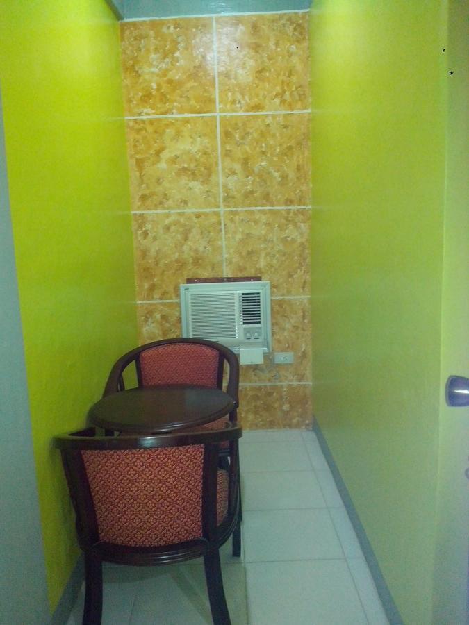 Centillo Travellers Inn Катиклан Екстериор снимка