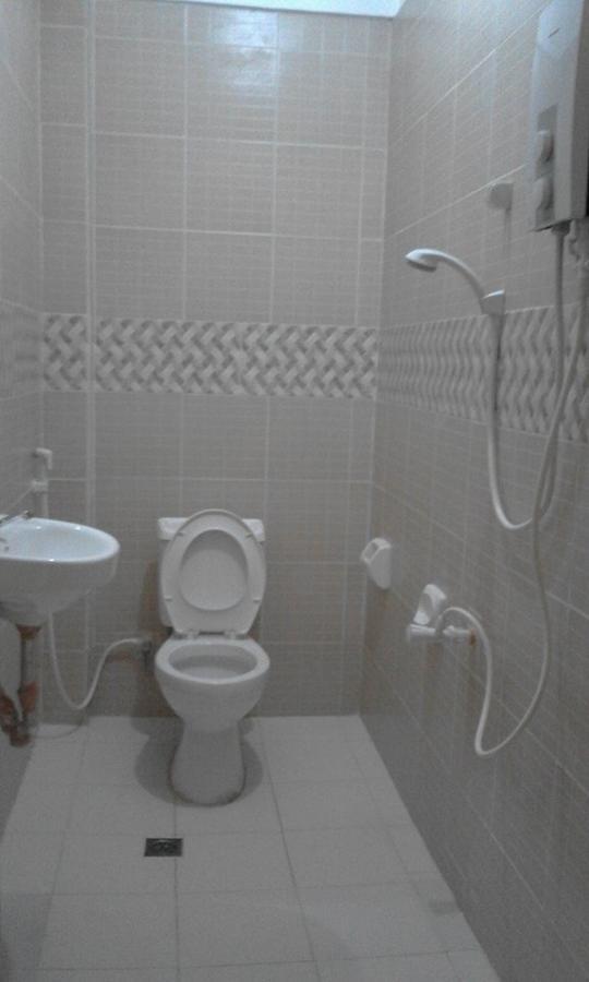 Centillo Travellers Inn Катиклан Стая снимка