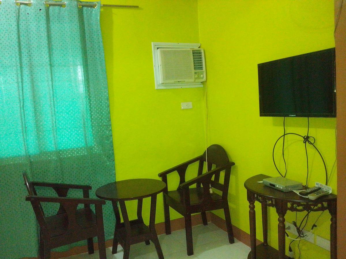 Centillo Travellers Inn Катиклан Екстериор снимка